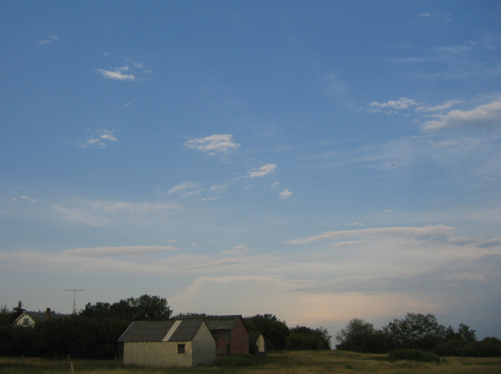 Saskatchewan farm outbuildings, with sky