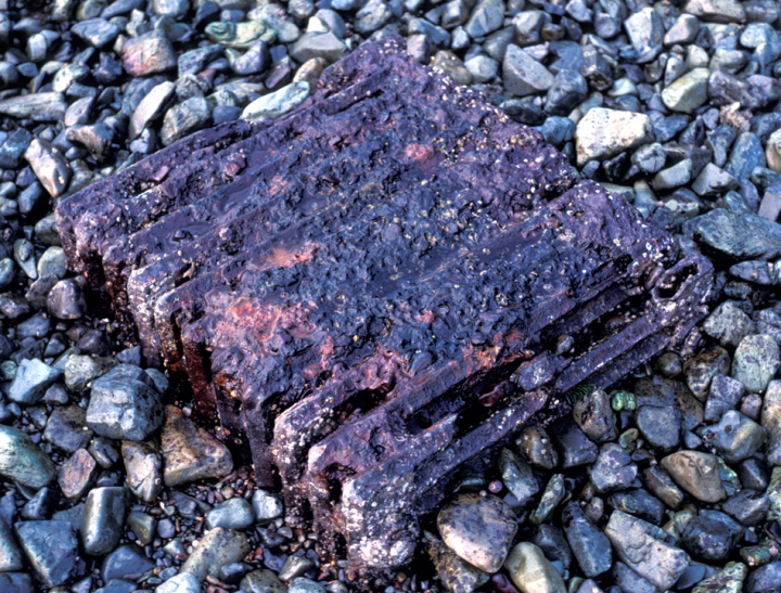 Rusting radiator on the beach