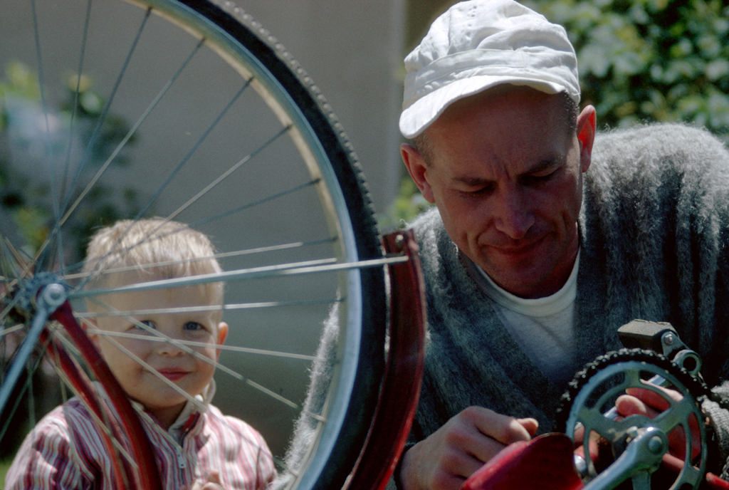 Bill Bray fixing Tim Bray’s bike, Rob Bray looking on