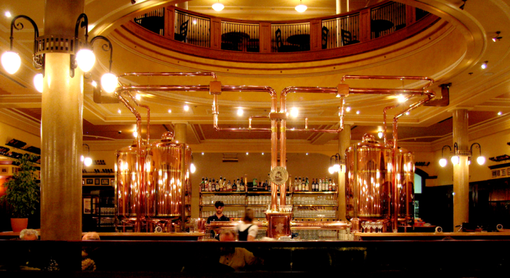 Copper piping behind the bar at the Paulaner beer restaurant, Munich