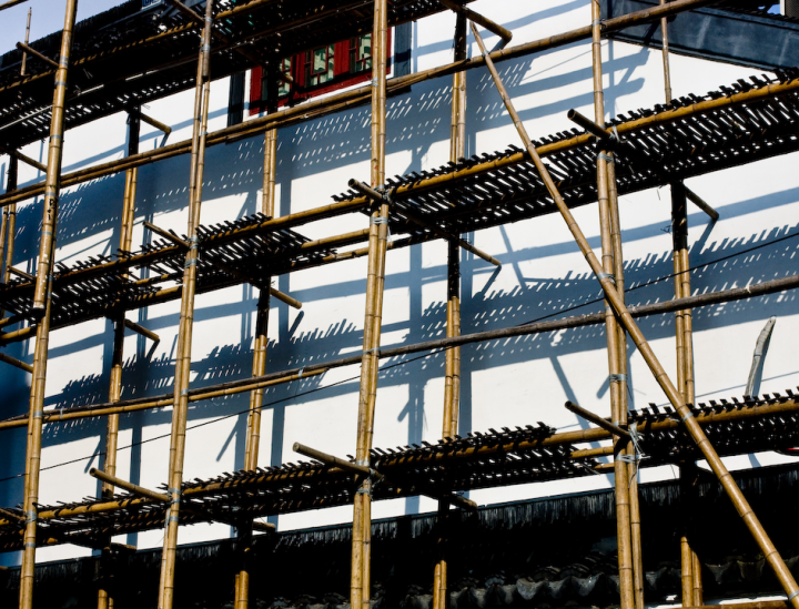Bamboo scaffolding casts shadows in the Yuyuan area of Shanghai