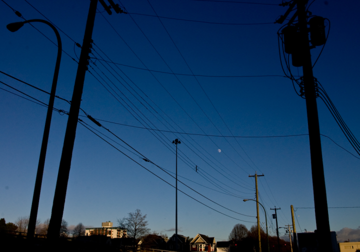 Poles and wires against Vancouver winter sky