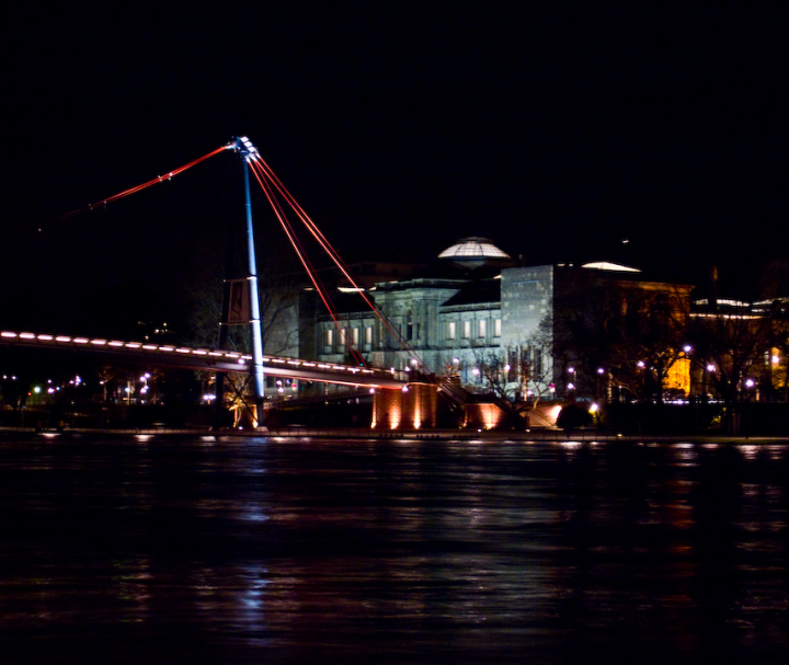 Shot across the Main river at night in Frankfurt