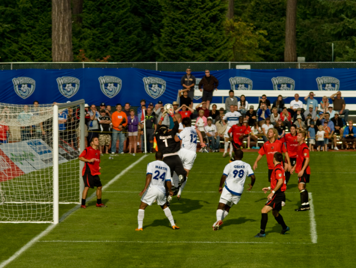 Goalmouth scramble in a Vancouver-Atlanta USL soccer game