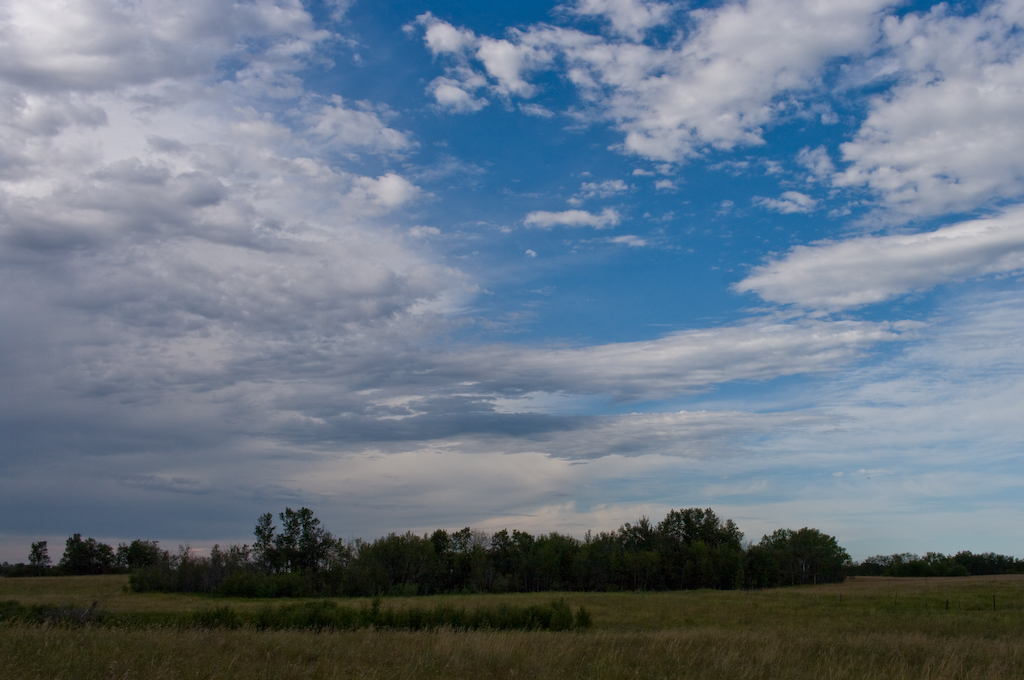 August afternoon sunset on a Saskatchewan farm