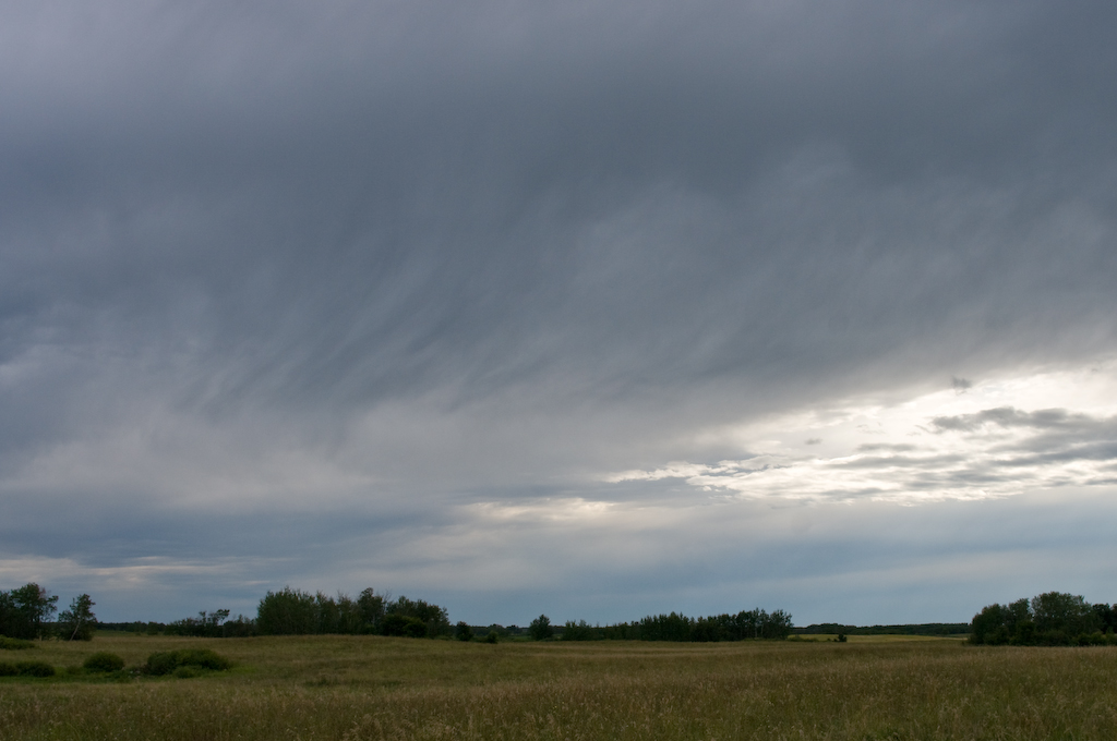 August afternoon sunset on a Saskatchewan farm