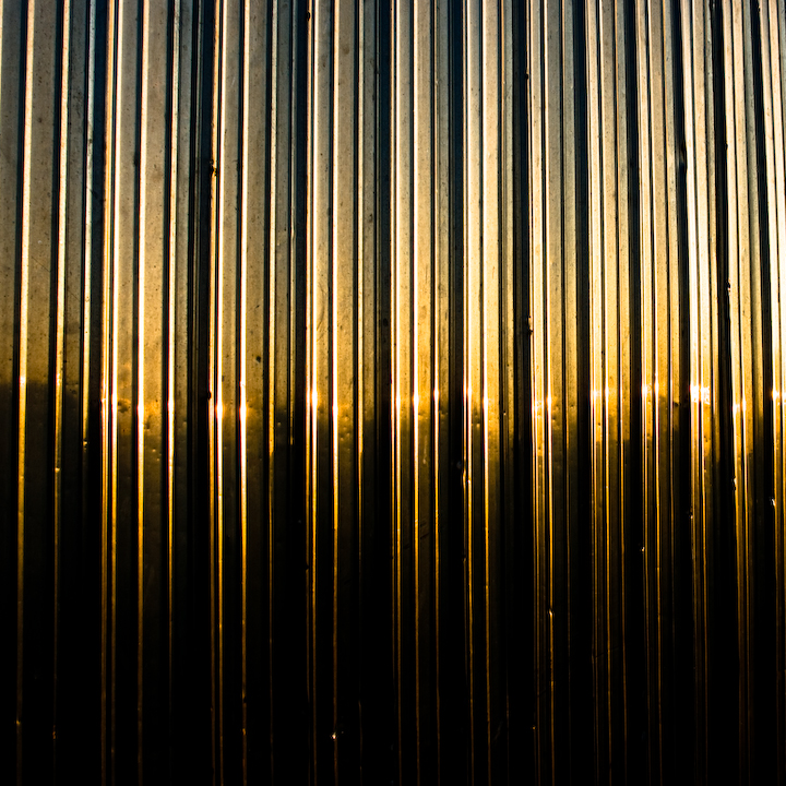 Barnyard shed reflects the sunset