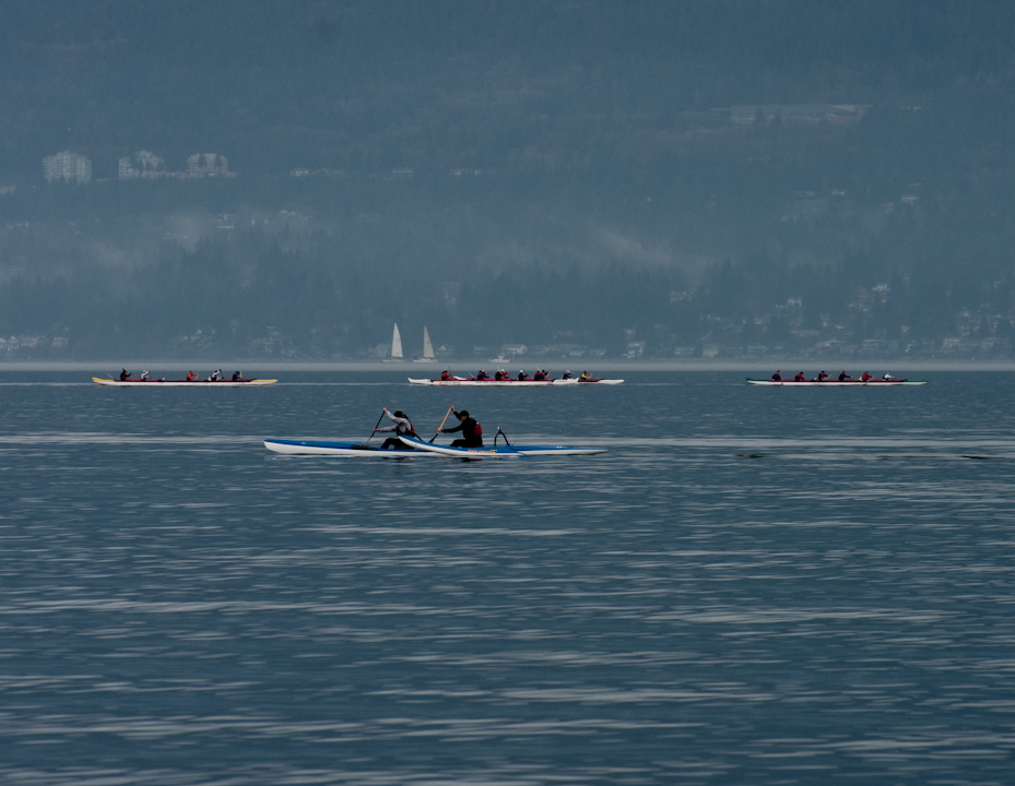 Two different kinds of racing rowboat in Vancouver’s outer harbour