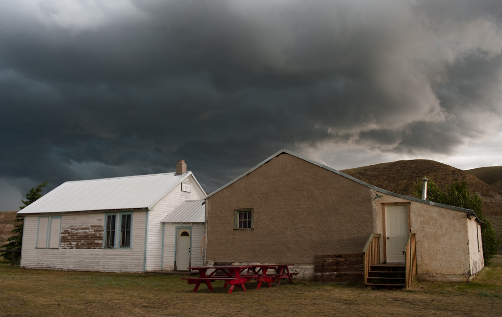 The school at Dorothy, Alberta, under stormy skies