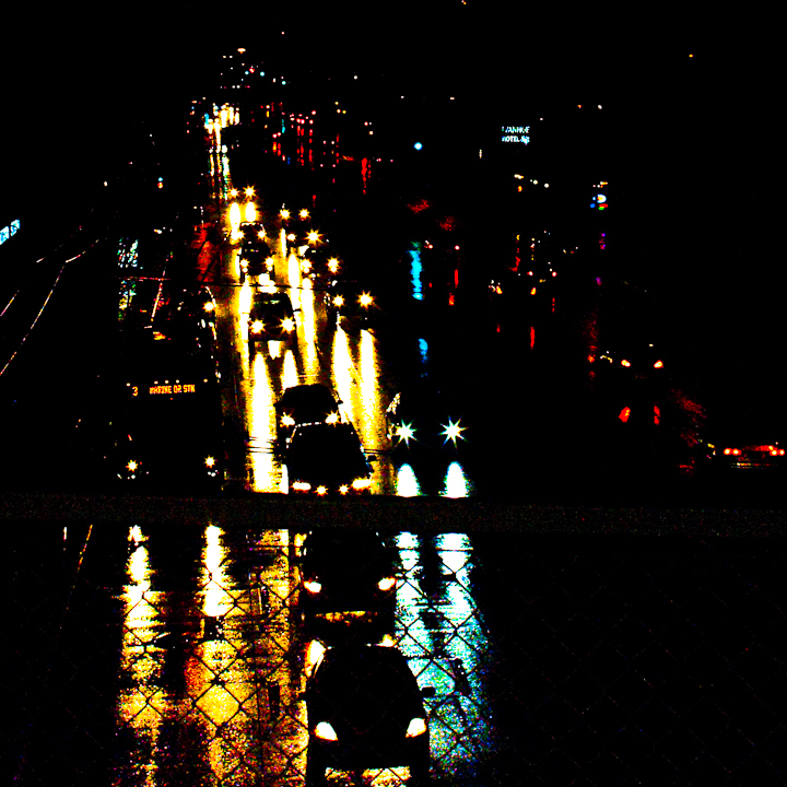 Rain-soaked Vancouver streets at night