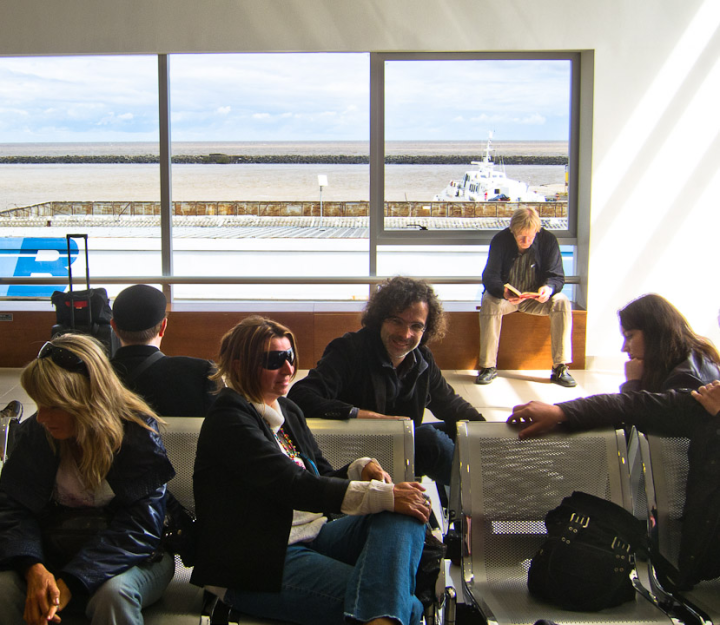 Orchestra members in the ferry terminal at Colonia Del Salvador