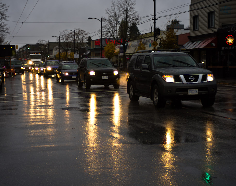 Rainy late-autumn city street scene