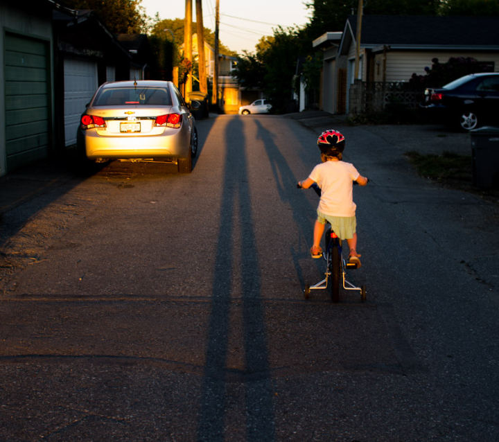 Young cyclist in the sunset