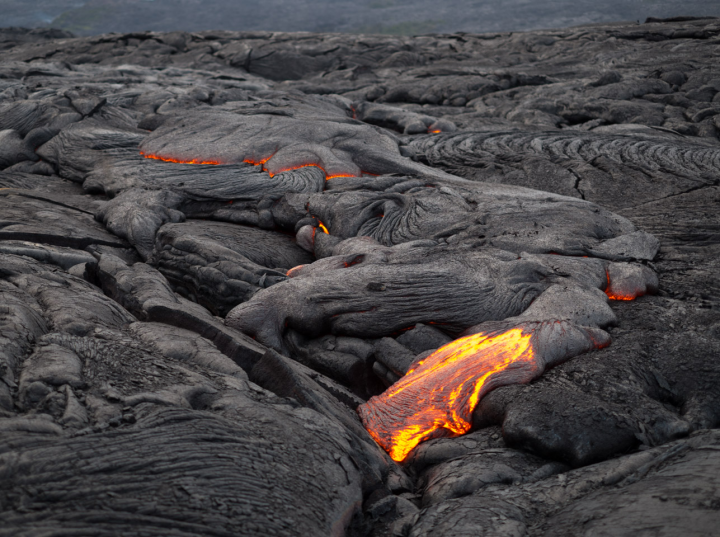 Standing in front of an advancing lava flow