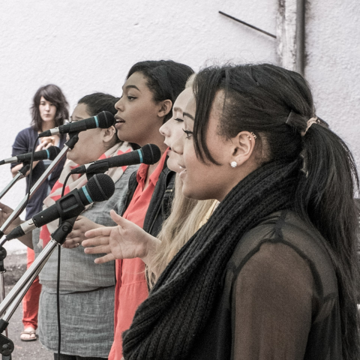 Four women singing at Main Street Autumn Shift