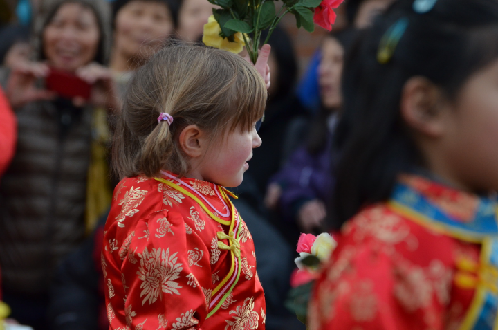 Girl flower dancer at the 2014 Vancouver Chinese New Year parade