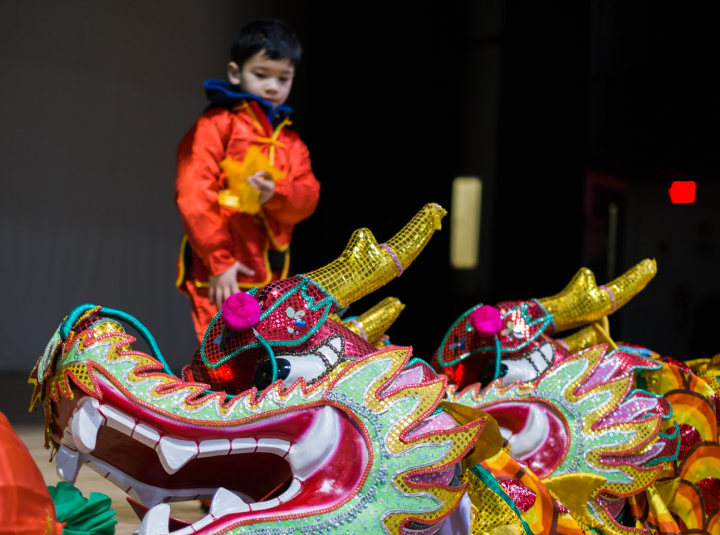 Boy and dragon before the 2014 Vancouver Chinese New Year parade