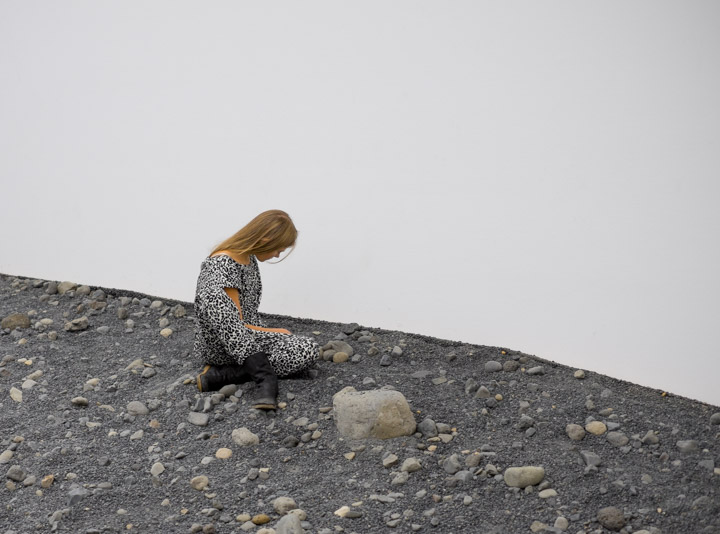 A young woman enjoys Riverbed by Olafur Eliasson