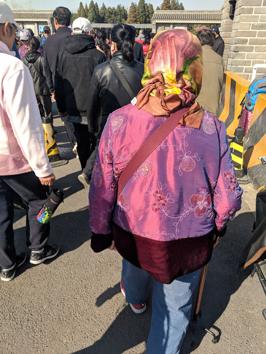 Lady in pink shiny top