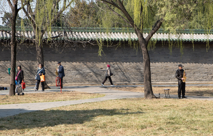 Saxophonists practice in the Temple of Heaven park, Beijing