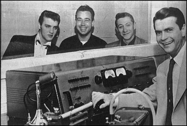 Elvis Presley, Bill Black, Scotty Moore, and Sam Phillips at Sun studios in 1954