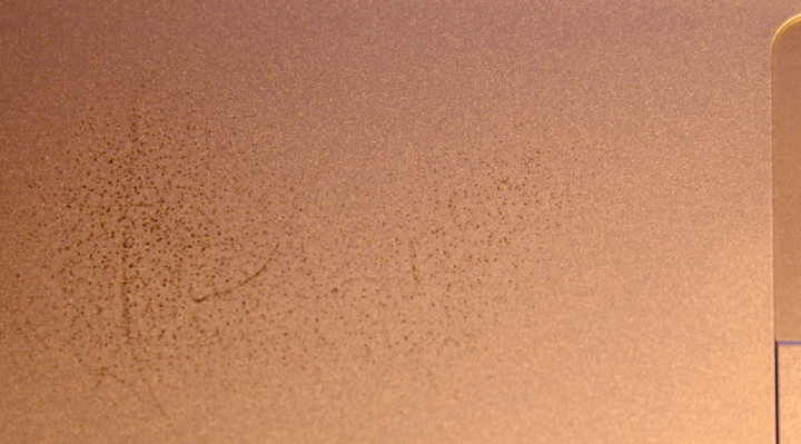 Corroding surface of Macintosh PowerBook Corroding surface of Macintosh PowerBook