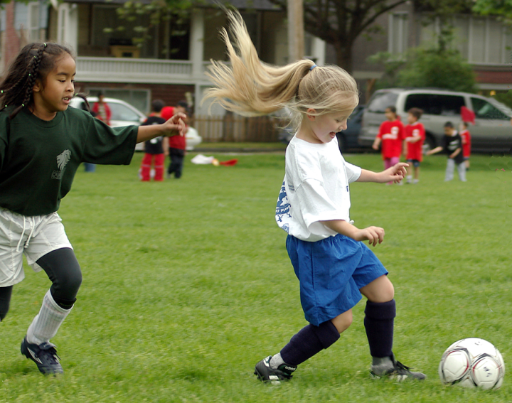 Children playing soccer