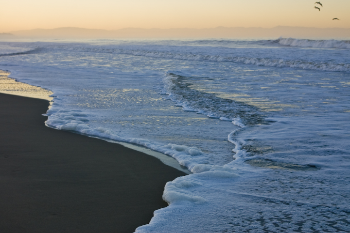 Pacific waves at sunrise