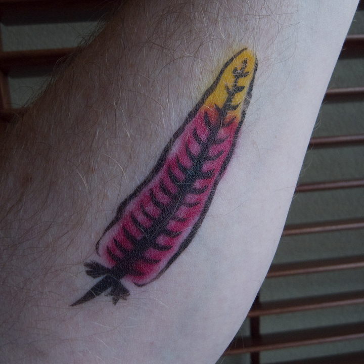 Apache feather mock-tattoo