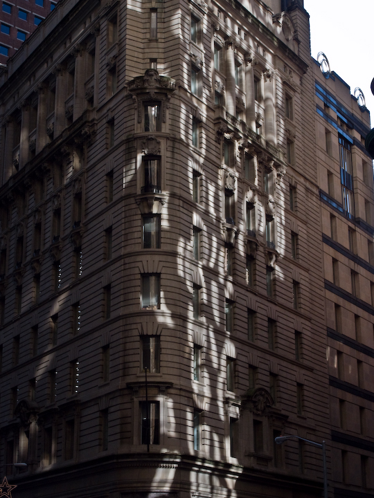 Reflections on a building in New York’s financial district