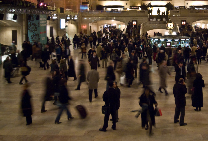People blurrily in motion in Grand Central Station’s main concourse