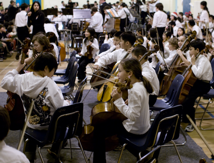 Fourth-grade string-instrument performers at the Christmas concert
