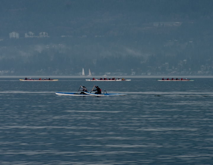 Two different kinds of racing rowboat in Vancouver’s outer harbour