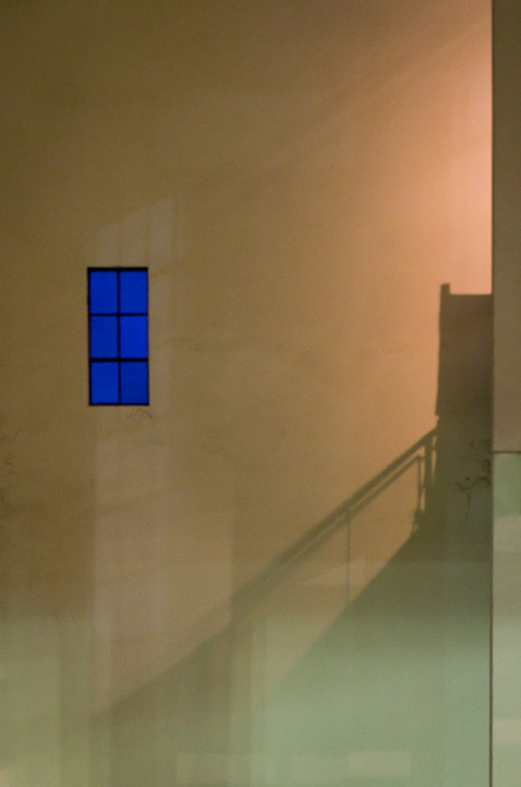 Blue window on shadowed wall at Porto Alegre’s Usina do Gasômetro