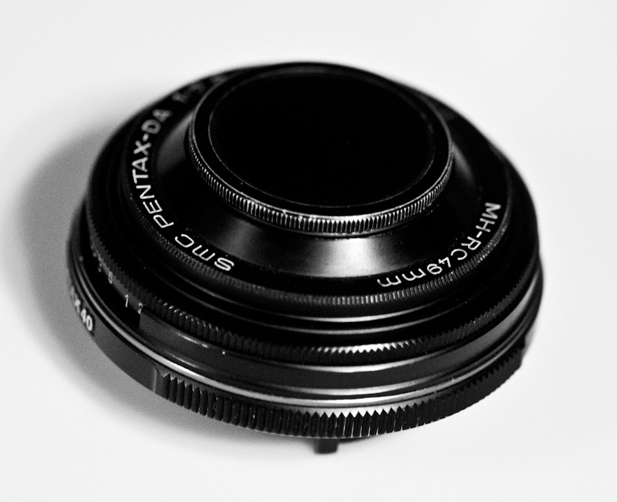 Beat-up looking Pentax 40mm “pancake” prime lens