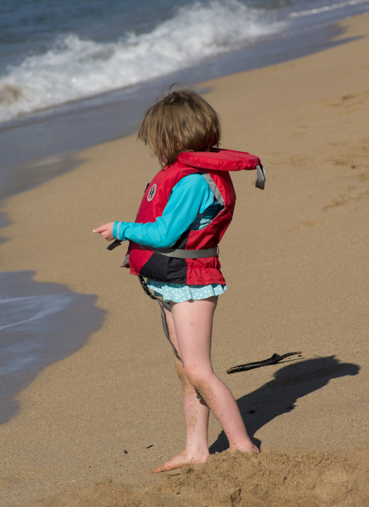 A kid on a beach on Maui