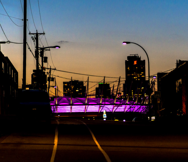 BC Place stadium in violet from the east