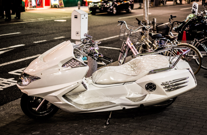 White scooter parked near Shibuya
