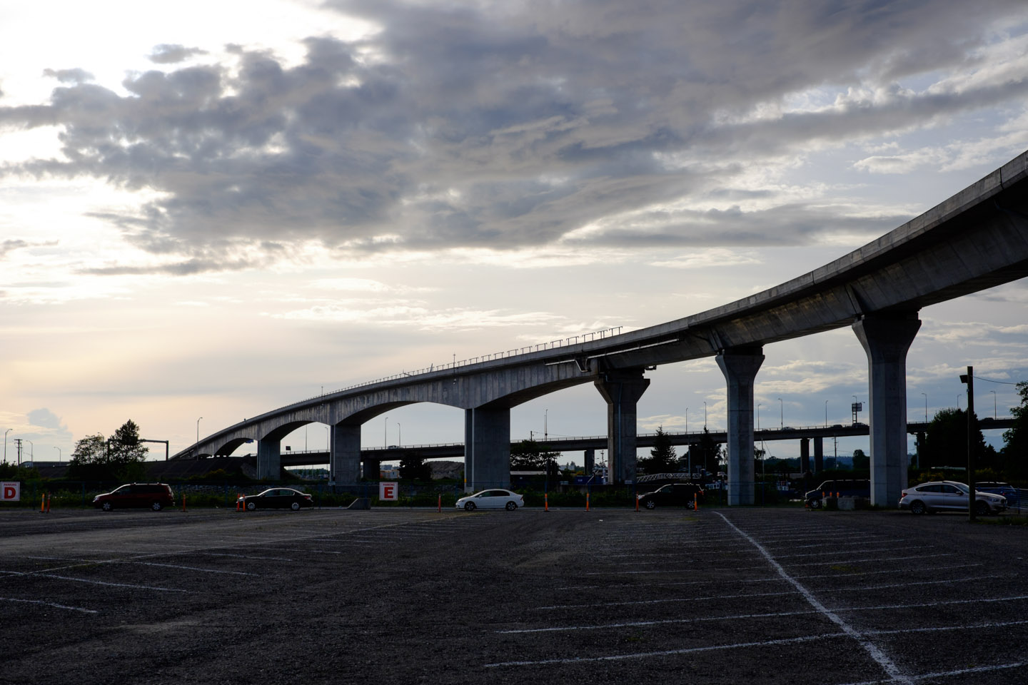 The Canada Line crossing the Richmond Night Market parking lot