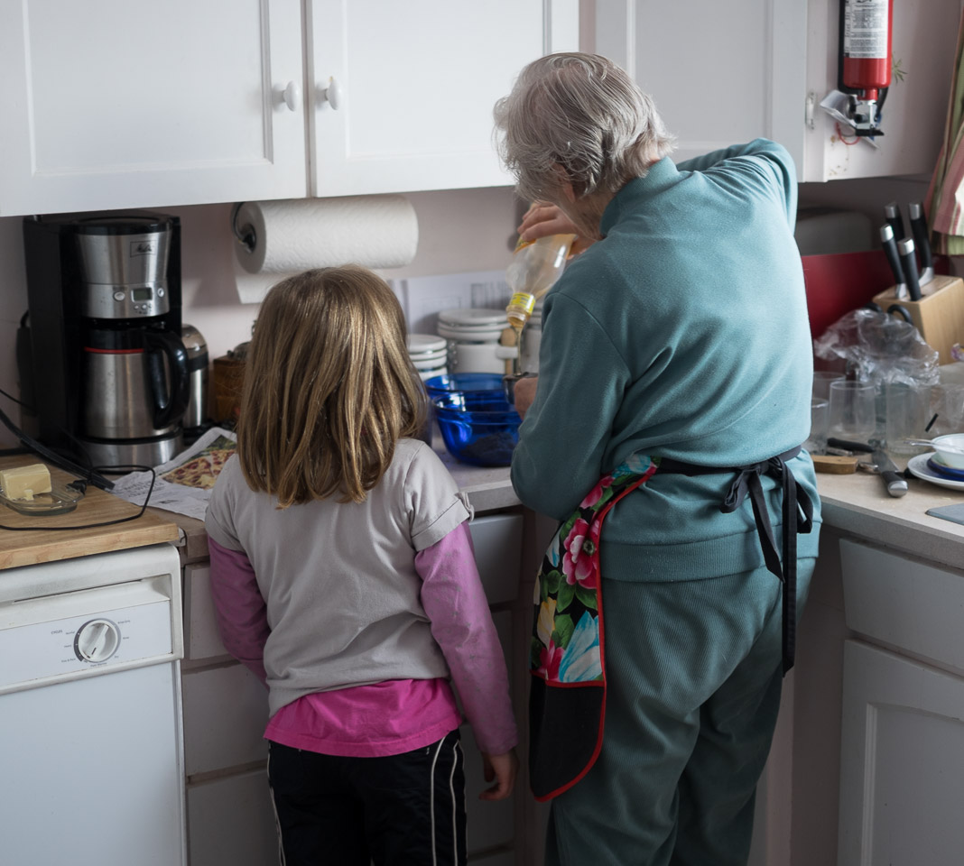 My mother teaches my daughter baking