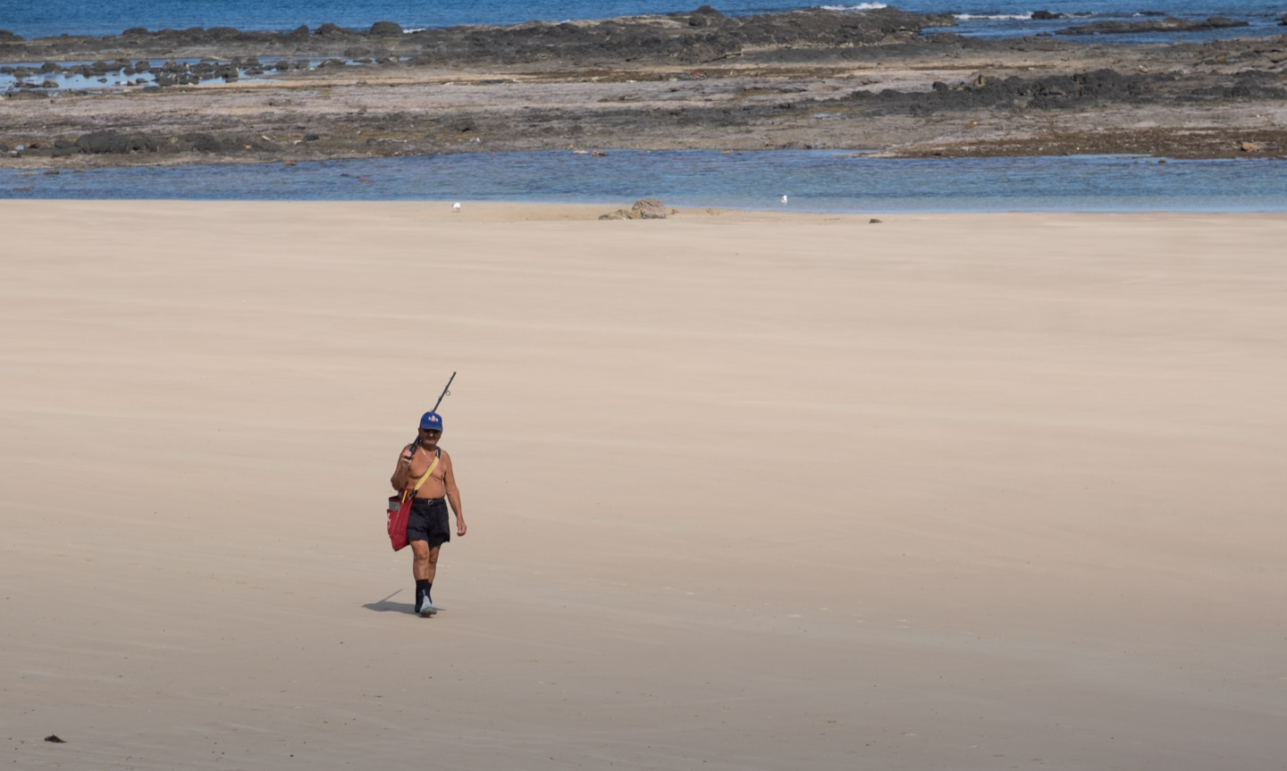 Fisherman on the beach