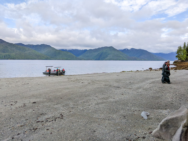 Walking up a beach in Gwaii Haanas