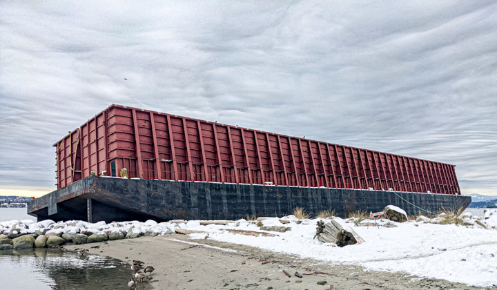 Cargo barge washed up on English Bay beach