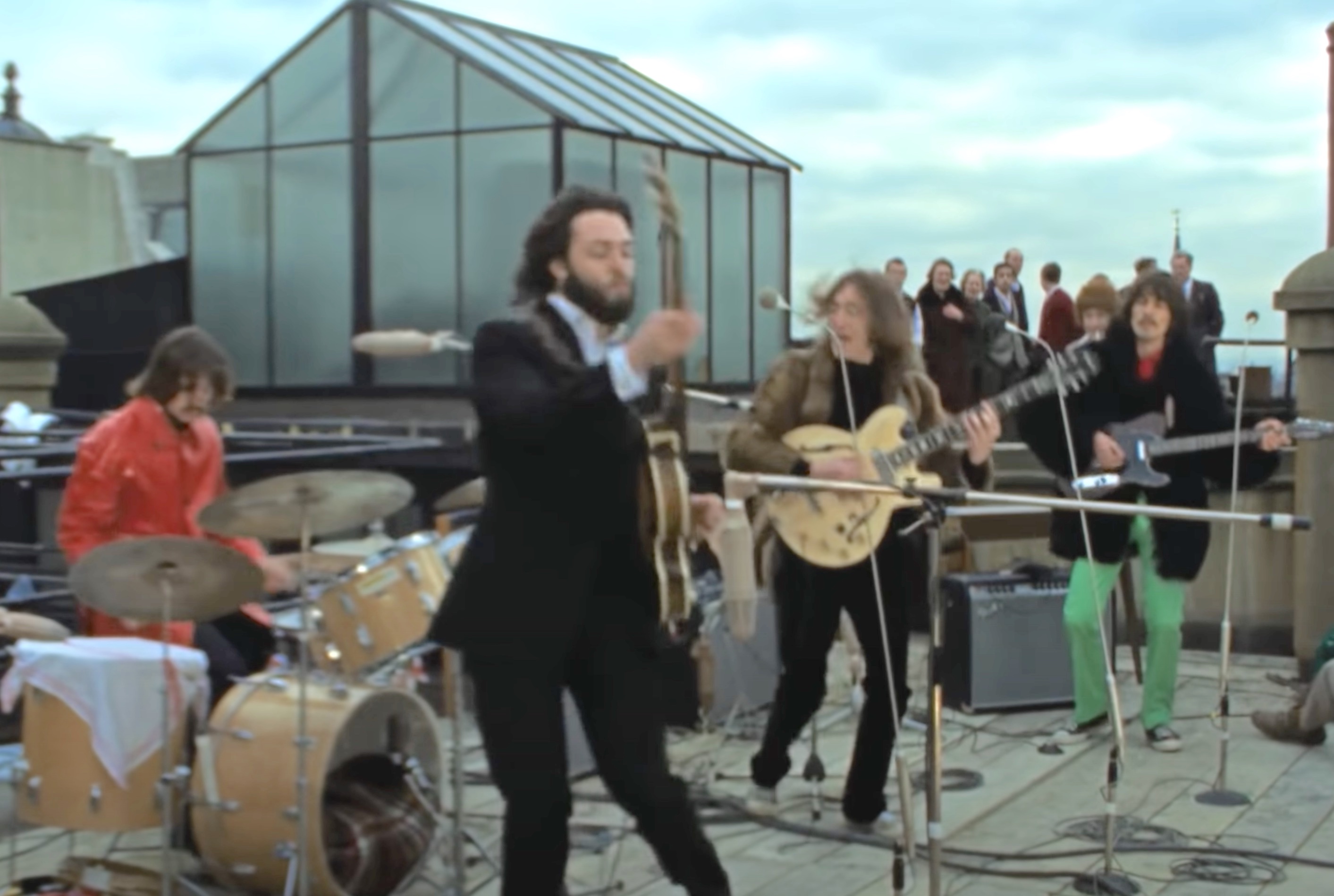 Beatles performing on the rooftop