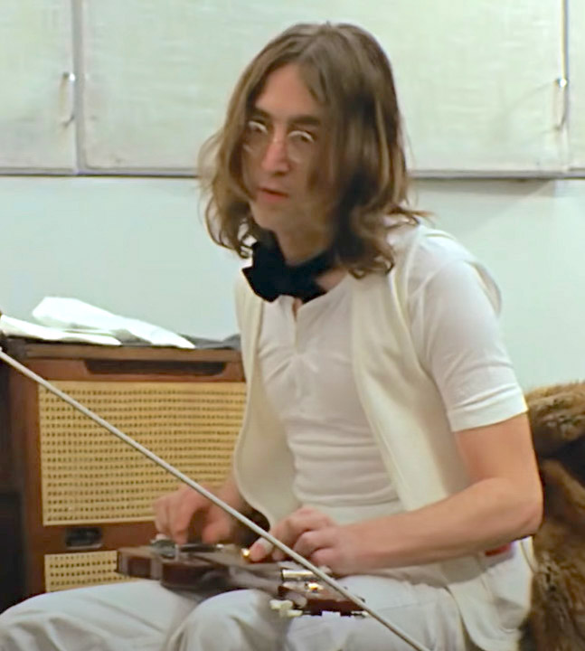 John Lennon playing lap steel guitar on “For You Blue”