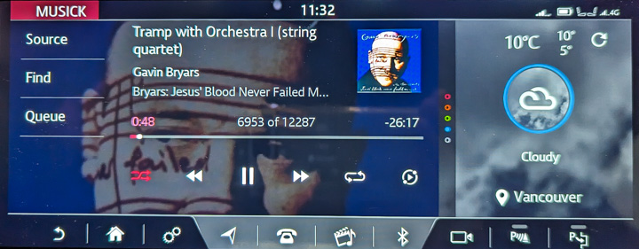 Jaguar infotainment showing current music and weather Jaguar infotainment showing current music and weather