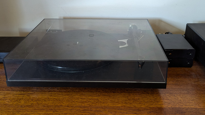Fosi V3 Mono amplifiers beside a Rega turntable