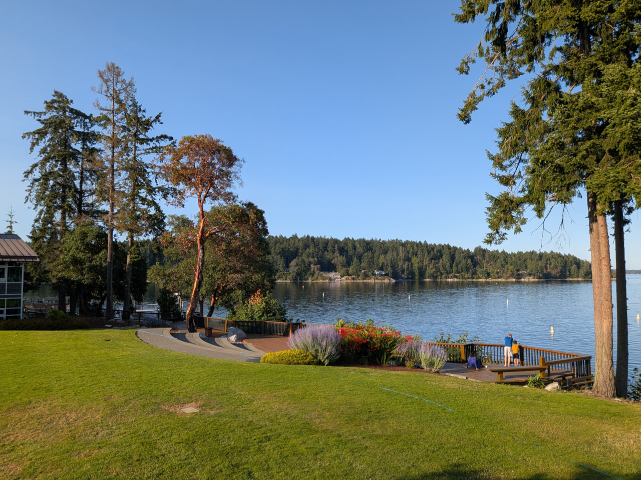 well-manicured lawns stretch down to the Pacific