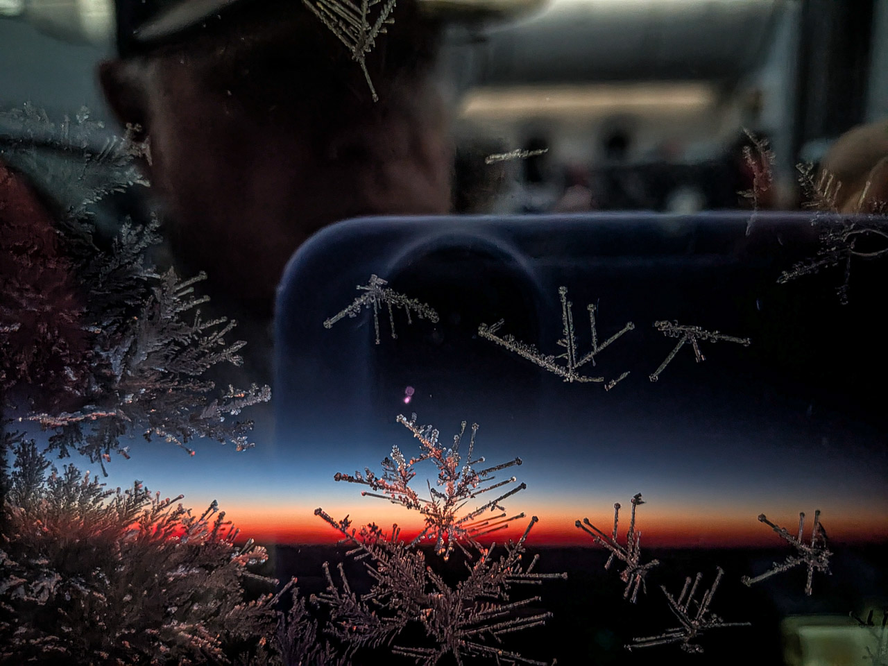 Ice crystals on airplane window